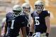 Gunner Kiel (right) threw for 300 yards in the Cincinnati spring game.