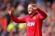 MANCHESTER, ENGLAND - MARCH 29: Wayne Rooney of Manchester United celebrates scoring his team's second goal from a penalty kick during the Barclays Premier League match between Manchester United and Aston Villa at Old Trafford on March 29, 2014 in Manche