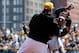 That's Travis Snider, racing onto the field of play from the dugout to go after Carlos Gomez.