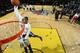NEW ORLEANS, LA - FEBRUARY 15: Thanasis Antetokounmpo #19 of the Deleware 87ers dunks over his brother, Giannis Antetokounmpo of the Milwaukee Bucks during the Slam Dunk Contest as part of the NBA Dream Factory presented by Boost Mobile 2014 at Sprint Ar