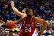 ORLANDO, FL - MARCH 20: T.J. Warren #24 of the North Carolina State Wolfpack drives to the basket against Jake Barnett #30 of the Saint Louis Billikens during the second round of the 2014 NCAA Men's Basketball Tournament at Amway Center on March 20, 2014