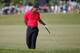 DORAL, FL - MARCH 09: Tiger Woods grimages after playing a bunker shot on the fifth hole during the final round of the World Golf Championships-Cadillac Championship at Trump National Doral on March 9, 2014 in Doral, Florida. (Photo by Chris Trotman/Get