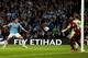 MANCHESTER, ENGLAND - APRIL 21: Martin Demichelis of Manchester City (L) scores their third goal past goalkeeper Ben Forster of West Bromwich Albion during the Barclays Premier League match between Manchester City and West Bromwich Albion at Etihad Stadi