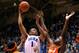 DURHAM, NC - FEBRUARY 22: Jabari Parker #1 of the Duke Blue Devils shoots over C.J. Fair #5 and Rakeem Christmas #25 of the Syracuse Orange during their game at Cameron Indoor Stadium on February 22, 2014 in Durham, North Carolina. (Photo by Grant Halve