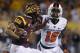 TEMPE, AZ - NOVEMBER 16: Defensive back Rashaad Reynolds #16 of the Oregon State Beavers tries to tackle D.J. Foster #8 of the Arizona State Sun Devils during the first quarter of their college football game at Sun Devil Stadium on November 16, 2013 in T