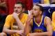 LOS ANGELES, CA - APRIL 21: Stephen Curry #30(R) and David Lee #10 of the Golden State Warriors sit out the fourth quarter against the Los Angeles Clippers in Game Two of the Western Conference Quarterfinals during the 2014 NBA Playoffs at Staples Center