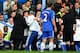 LONDON, ENGLAND - APRIL 19: Chelsea coach Rui Faria is held back by Jose Mourinho and other members of coaching staff as he confronts match referee Mike Dean during the Barclays Premier League match between Chelsea and Sunderland at Stamford Bridge on Ap