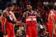 CHICAGO, IL APRIL 20: John Wall #2 and Bradley Beal #3 of the Washington Wizards slap hands during a game against the Chicago Bulls during Game 1 of the Eastern Conference Quarterfinals on April 20, 2014 at the United Center in Chicago, Illinois. NOTE TO