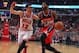 Apr 20, 2014; Chicago, IL, USA; Washington Wizards guard John Wall (2) is defended by Chicago Bulls guard Kirk Hinrich (12) during the first quarter of game one of the first round of the 2014 NBA Playoffs at the United Center. Mandatory Credit: Dennis Wie