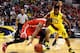 INDIANAPOLIS, IN - MARCH 15: Shannon Scott #3 of the Ohio State Buckeyes tries to keep controls of the ball against Derrick Walton Jr. #10 of the Michigan Wolverines during the first half of the Big Ten Basketball Tournament Semifinal game at Bankers Lif