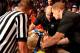 WWE staff attends to Daniel Bryan.