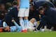 MANCHESTER, ENGLAND - APRIL 21: An injured David Silva of Manchester City is given treatment during the Barclays Premier League match between Manchester City and West Bromwich Albion at Etihad Stadium on April 21, 2014 in Manchester, England. (Photo by