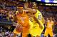 INDIANAPOLIS, IN - MARCH 28: Jarnell Stokes #5 of the Tennessee Volunteers drives to the basket against Jon Horford #15 of the Michigan Wolverines during the regional semifinal of the 2014 NCAA Men's Basketball Tournament at Lucas Oil Stadium on March 28