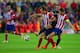 MADRID, SPAIN - APRIL 22: Fernando Torres of Chelsea is closed down by and Diego Godin and Gabi of Club Atletico de Madrid during the UEFA Champions League Semi Final first leg match between Club Atletico de Madrid and Chelsea at Vicente Calderon Stadium