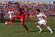 BRIDGEVIEW, IL - APRIL 19: Quincy Amarikwa #24 of the Chicago Fire controls the ball in front of Kevin Alston #30 of the New England Revolution during an MLS match at Toyota Park on April19, 2014 in Bridgeview, Illinois. The Fire and the Revolution tied