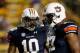 Sep 21, 2013; Baton Rouge, LA, USA; Auburn Tigers defensive end Elijah Daniel (97) and linebacker LaDarius Owens (10) against the LSU Tigers during the second half of a game at Tiger Stadium. LSU defeated Auburn 35-21. Mandatory Credit: Derick E. Hingle-U