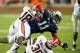 AUBURN, AL - NOVEMBER 10: Strong safety Shawn Williams #36 and free safety Bacarri Rambo #18 of the Georgia Bulldogs tackle tight end Brandon Fulse #11 of the Auburn Tigers on November 10, 2012 at Jordan-Hare Stadium in Auburn, Alabama. Georgia leads Aub