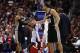 LOS ANGELES, CA - FEBRUARY 18: Patty Mills (L) #8 of the San Antonio Spurs is congratulated by Manu Ginobili #20 after scoring a basket against the Los Angeles Clippers in the second half at Staples Center on February 18, 2014 in Los Angeles, California.
