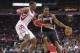 Jan 20, 2014; Houston, TX, USA; Portland Trail Blazers power forward LaMarcus Aldridge (12) controls the ball during the third quarter as Houston Rockets center Dwight Howard (12) defends at Toyota Center. The Rockets defeated the Trailblazers 126-113. Ma