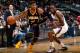 ATLANTA, GA - JANUARY 08: Paul George #24 of the Indiana Pacers drives against DeMarre Carroll #5 of the Atlanta Hawks at Philips Arena on January 8, 2014 in Atlanta, Georgia. NOTE TO USER: User expressly acknowledges and agrees that, by downloading and