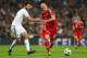MADRID, SPAIN - APRIL 23: Arjen Robben of Bayern Muenchen is challenged by Xabi Alonso of Real Madrid during the UEFA Champions League semi-final first leg match between Real Madrid and FC Bayern Muenchen at the Estadio Santiago Bernabeu on April 23, 2014
