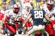 Sep 14, 2013; Pittsburgh, PA, USA; New Mexico Lobos running back Crusoe Gongbay (2) carries the ball against the Pittsburgh Panthers during the third quarter at Heinz Field. The Pittsburgh Panthers won 49-27. Mandatory Credit: Charles LeClaire-USA TODAY S