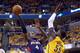 INDIANAPOLIS, IN - APRIL 19: Paul Milsap #4 of the Atllanta Hawks shoots the ball while defended by Roy Hibbert #55 of the Indiana Pacers in Game 1 of the Eastern Conference Quarterfinals during the 2014 NBA Playoffs at Bankers Life Fieldhouse on April 1