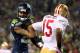 SEATTLE, WA - JANUARY 19: Cornerback Richard Sherman #25 of the Seattle Seahawks talks with the referee after being called for an unsportsmanlike penalty for taunting wide receiver Michael Crabtree #15 of the San Francisco 49ers late in the fourth quarte