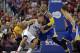 Apr 21, 2014; Los Angeles, CA, USA; Golden State Warriors forward Marreese Speights (5) defends against Los Angeles Clippers forward Blake Griffin (32) during the second quarter in game two during the first round of the 2014 NBA Playoffs at Staples Center