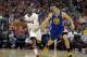 Apr 21, 2014; Los Angeles, CA, USA; Golden State Warriors guard Klay Thompson (11) defends against Los Angeles Clippers guard Chris Paul (3) during the third quarter in game two during the first round of the 2014 NBA Playoffs at Staples Center. Mandatory