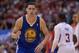 Apr 19, 2014; Los Angeles, CA, USA; Golden State Warriors guard Klay Thompson (11) heads down court after a 3-point basket in the second half of game one of the first round of the 2014 NBA Playoffs at Staples Center. Warriors won 109-105. Mandatory Credit