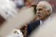 Apr 11, 2014; Washington, DC, USA; Chicago Blackhawks head coach Joel Quenneville watches from behind the bench against the Washington Capitals in the second period at Verizon Center. The Capitals won 4-0. Mandatory Credit: Geoff Burke-USA TODAY Sports