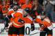 PHILADELPHIA, PA - APRIL 22: Andrew MacDonald #47, Mark Streit #32, and Claude Giroux #28 of the Philadelphia Flyers celebrate Streit's first period goal against the New York Rangers in Game Three of the First Round of the 2014 Stanley Cup Playoffs at the