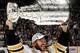 VANCOUVER, BC - JUNE 15: Mark Recchi #28 of the Boston Bruins hoists the Stanley Cup after defeating the Vancouver Canucks 4-0 in Game Seven of the 2011 NHL Stanley Cup Finals at the Rogers Arena on June 15, 2011 in Vancouver, Canada. (Photo by Dave San