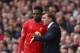 LIVERPOOL, ENGLAND - MARCH 30: Liverpool Manager Brendan Rodgers speaks to Daniel Sturridge during the Barclays Premier League match between Liverpool and Tottenham Hotspur at Anfield on March 30, 2014 in Liverpool, England. (Photo by Alex Livesey/Getty