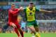 NORWICH, ENGLAND - APRIL 20: Lucas Leiva of Liverpool and Robert Snodgrass of Norwich City battle for the ball during the Barclays Premier League match between Norwich City and Liverpool at Carrow Road on April 20, 2014 in Norwich, England. (Photo by Ja