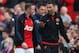 MANCHESTER, ENGLAND - MARCH 29: Wayne Rooney of Manchester United walks off with Ryan Giggs (R) at the end of the Barclays Premier League match between Manchester United and Aston Villa at Old Trafford on March 29, 2014 in Manchester, England. (Photo by