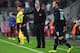 MUNICH, GERMANY - APRIL 09: David Moyes, manager of Manchester United gives instructions to Wayne Rooney during the UEFA Champions League Quarter Final second leg match between FC Bayern Muenchen and Manchester United at Allianz Arena on April 9, 2014 in