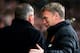 LONDON, ENGLAND - MARCH 22: (L-R) Opposing managers Sam Allardyce the West Ham manager and David Moyes the Manchester United manager greet each other prior to kcikoff during the Barclays Premier League match between West Ham United and Manchester United