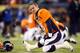EAST RUTHERFORD, NJ - FEBRUARY 02: Quarterback Peyton Manning #18 of the Denver Broncos warms up prior to Super Bowl XLVIII against the Seattle Seahawks at MetLife Stadium on February 2, 2014 in East Rutherford, New Jersey. (Photo by Jeff Gross/Getty Im