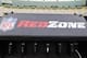 Sep 13, 2012; Green Bay, WI, USA; NFL Red Zone logo telephones on the Green Bay Packers sidelines prior to the game against the Chicago Bears at Lambeau Field. The Packers defeated the Bears 23-10. Mandatory Credit: Jeff Hanisch-USA TODAY Sports