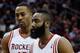 HOUSTON, TX - MARCH 01: Dwight Howard #12 and James Harden #13 of the Houston Rockets walk across the court during the game against the Detroit Pistons at the Toyota Center on March 1, 2014 in Houston, Texas. NOTE TO USER: User expressly acknowledges and