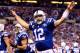 INDIANAPOLIS, IN - JANUARY 04: Quarterback Andrew Luck #12 of the Indianapolis Colts celebrates a fourth quarter touchdown against the Kansas City Chiefs during a Wild Card Playoff game at Lucas Oil Stadium on January 4, 2014 in Indianapolis, Indiana. (
