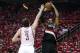 Apr 23, 2014; Houston, TX, USA; Portland Trail Blazers forward LaMarcus Aldridge (12) shoots during the second quarter as Houston Rockets center Omer Asik (3) defends in game two during the first round of the 2014 NBA Playoffs at Toyota Center. Mandatory