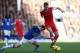 LIVERPOOL, ENGLAND - DECEMBER 29: Calum Chambers of Southampton tangles with Leighton Baines of Everton during the Barclays Premier League match between Everton and Southampton at Goodison Park on December 29, 2013 in Liverpool, England. (Photo by Clive