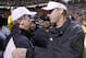 Spurrier and Kiffin share an embrace.