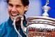 BARCELONA, SPAIN - APRIL 28: Rafael Nadal of Spain bites the trophy after winning his final match againts Nicolas Almagro of Spain during day seven of the 2013 Barcelona Open Banc Sabadell on April 28, 2013 in Barcelona. Rafael Nadal won 6-4, 6-3. (Phot