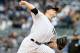 NEW YORK, NY - APRIL 07: David Phelps #41 of the New York Yankees delivers a pitch against the Baltimore Orioles during the home opener on April 7, 2014 at Yankee Stadium in the Bronx borough of New York City.The New York Yankees defeated the Baltimore O