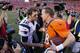 DENVER, CO - JANUARY 19: Tom Brady #12 of the New England Patriots congratulates Peyton Manning #18 of the Denver Broncos after the Broncos defeated the Patriots 26 to 16 during the AFC Championship game at Sports Authority Field at Mile High on January