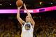 OAKLAND, CA - APRIL 24: Klay Thompson #11 of the Golden State Warriors takes a shot against the Los Angeles Clippers in Game Three of the Western Conference Quarterfinals during the 2014 NBA Playoffs on April 24, 2014 at Oracle Arena in Oakland, Californi